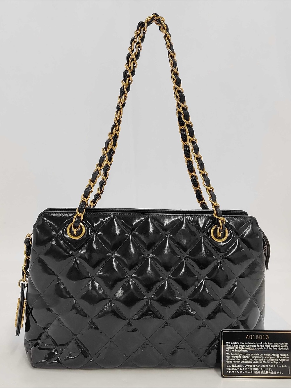 CHANEL Black Quilted Patent Shoulder Bag with Gold Chain Strap